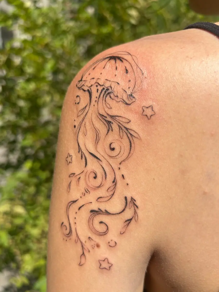 Dreamy jellyfish tattoo with flowing elegance
