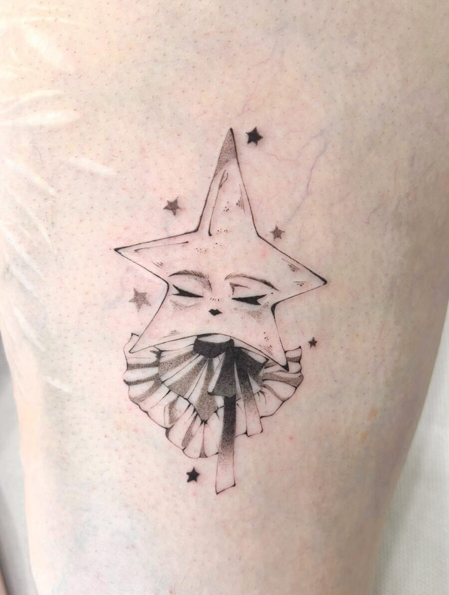 Enchanting whimsical star face tattoo