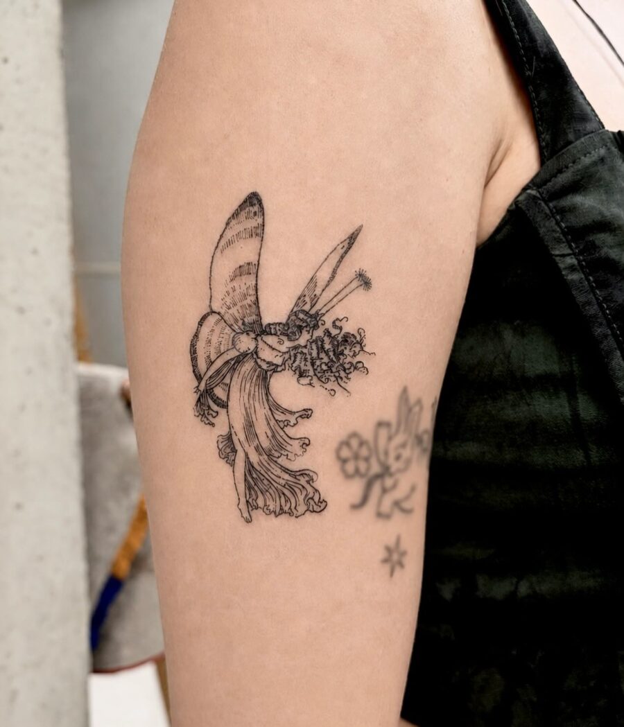 Enchanting fairy tattoo with whimsical flowers