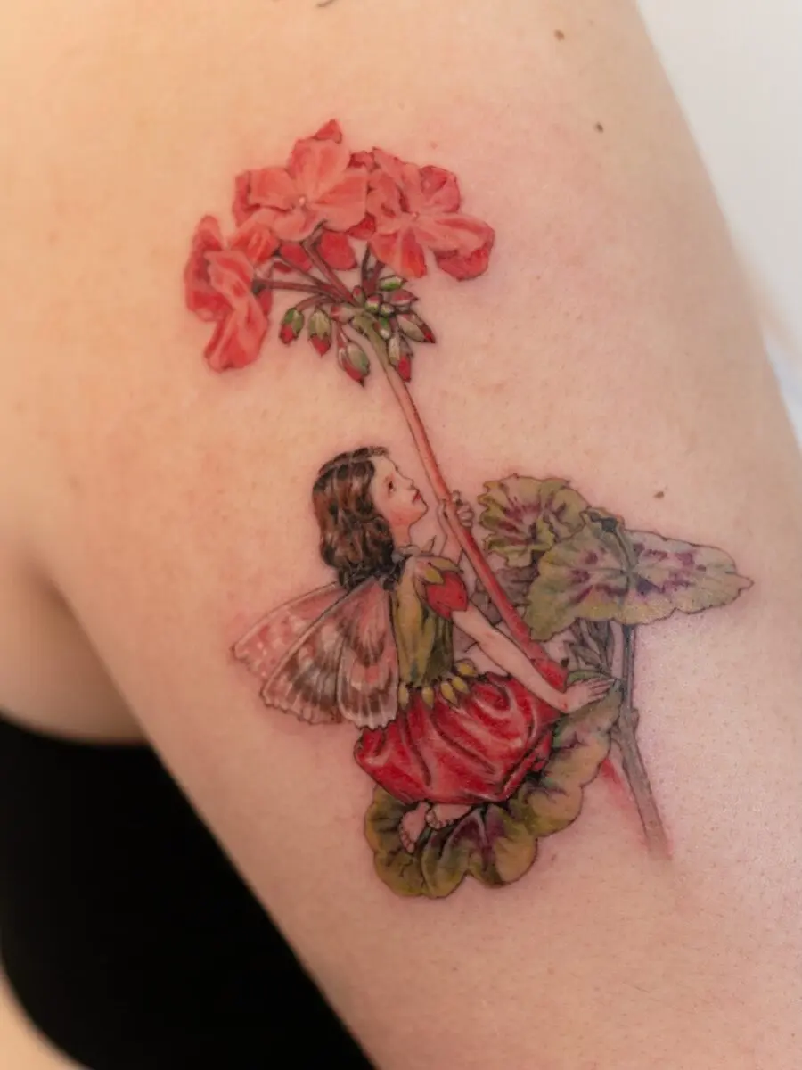 Delightful fairy and floral tattoo design