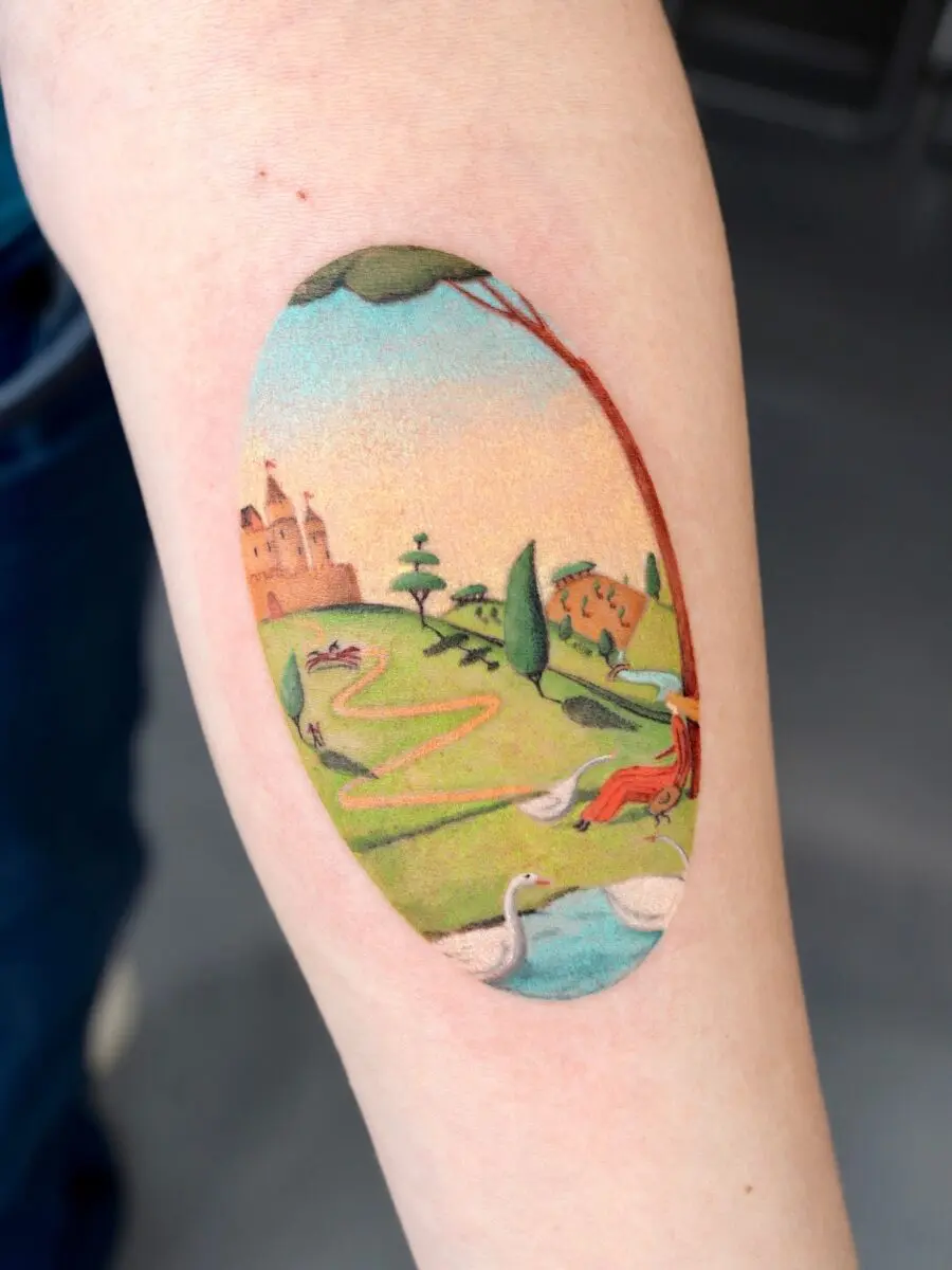A whimsical landscape tattoo bursting with color