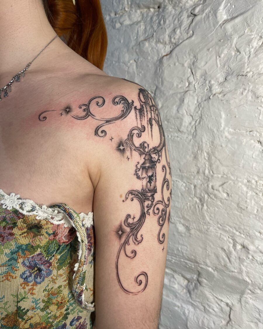Intricately designed floral whimsy on shoulder
