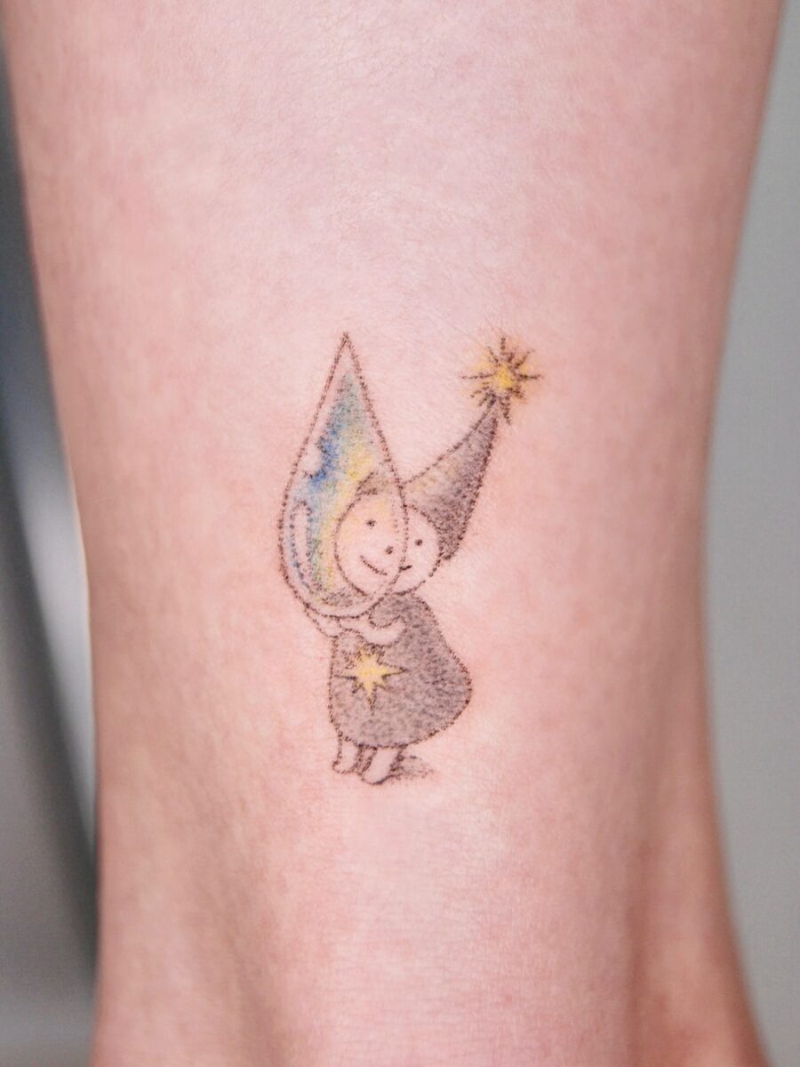Charming fairy tattoo with playful colors