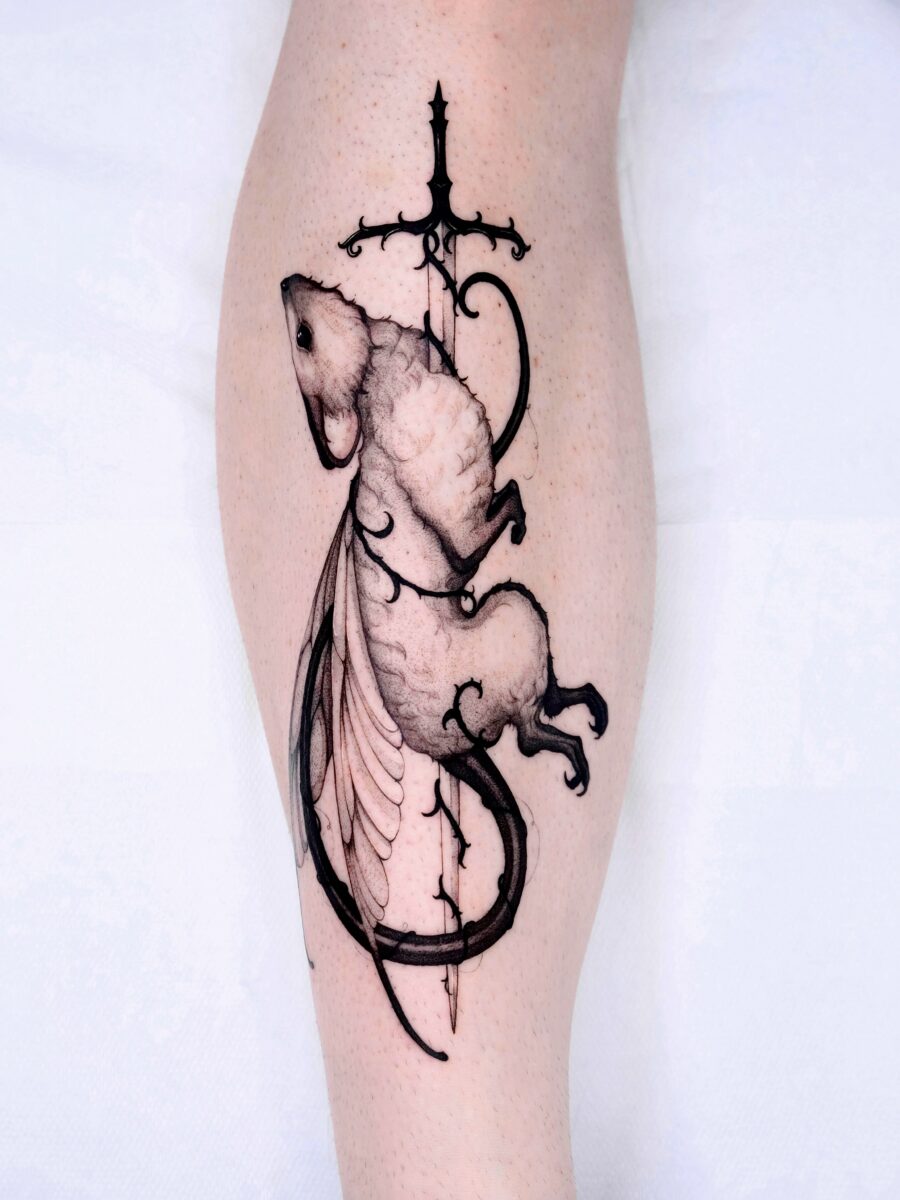 Intricate Design of a Winged Mouse Tattoo