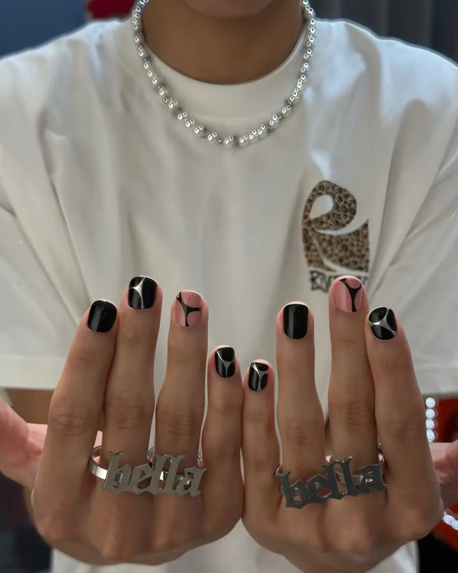Chic black and pink Y2K nail art inspiration