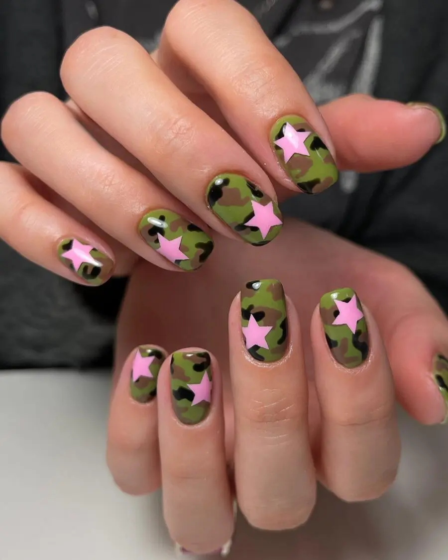 Vibrant Y2K nails with camo and stars