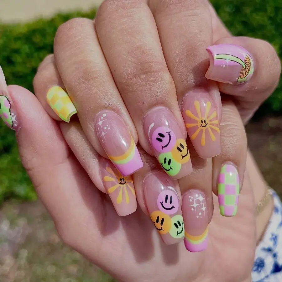 Vibrant nails with playful smiley faces