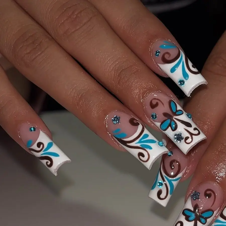 Chic floral Y2K nails with bold accents