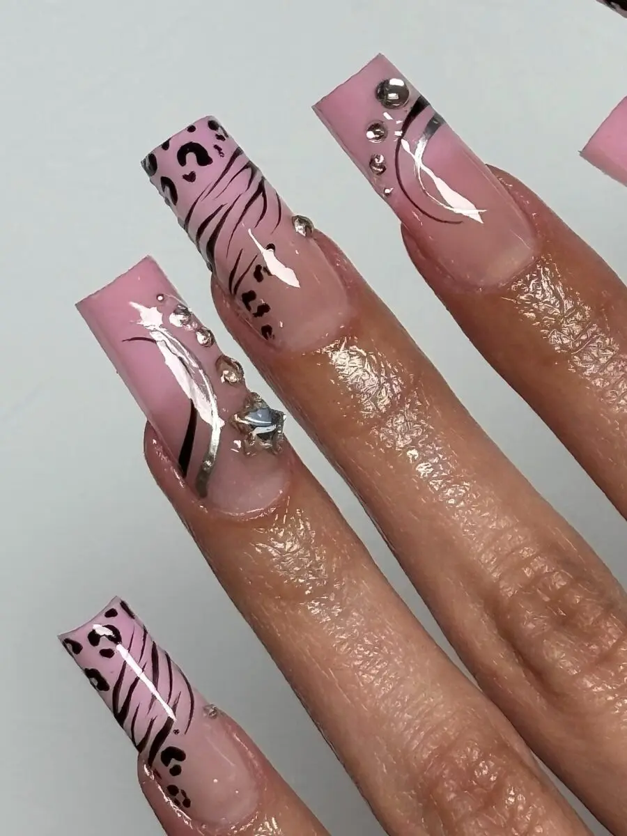 Stylish pink leopard print nail design