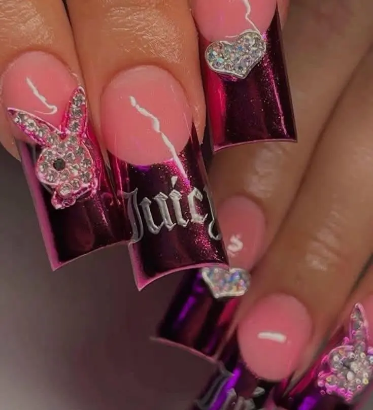Playful Y2K-inspired pink and purple nails