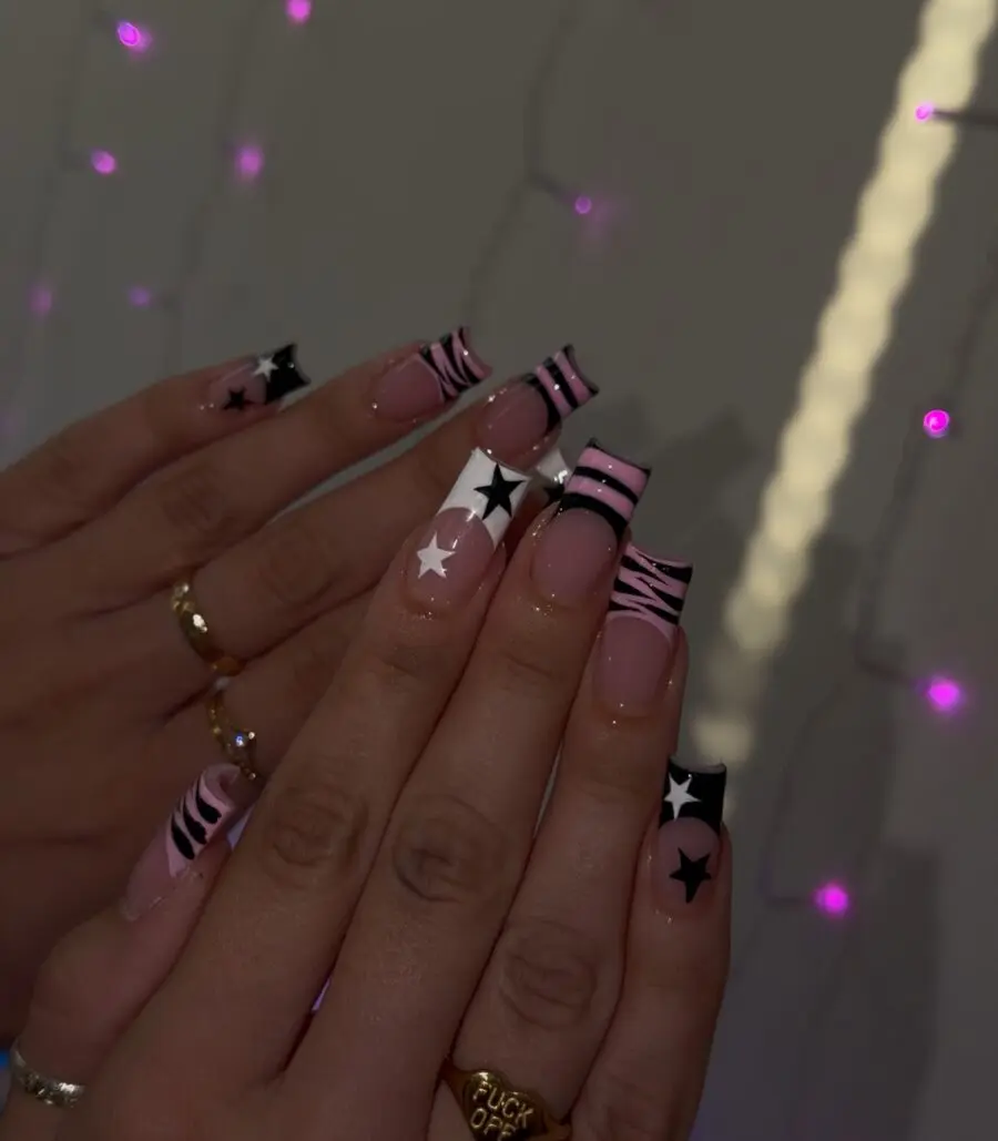 Vibrant Y2K-inspired nails with playful designs