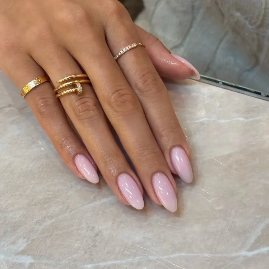Elegant almond nails with a soft pink hue