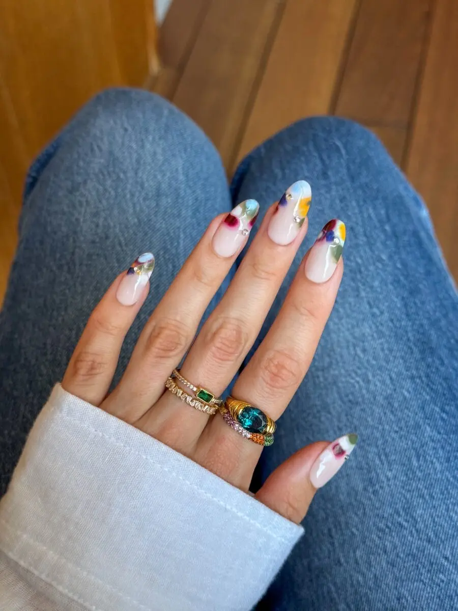 Chic almond nails with floral design details