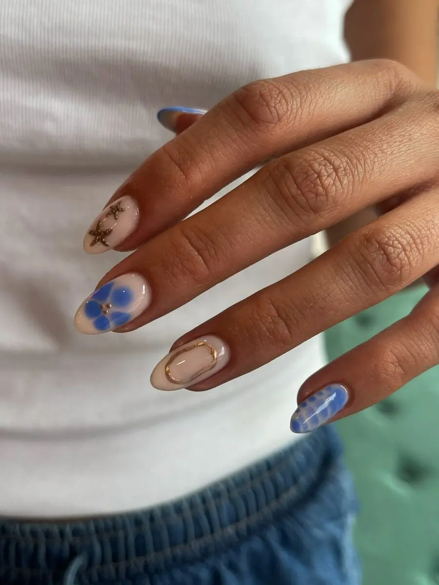 Playful almond nails with floral accents