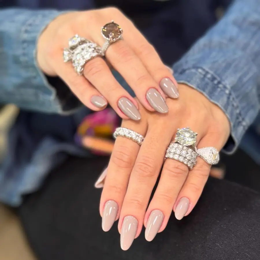 Elegant almond nails with stunning rings