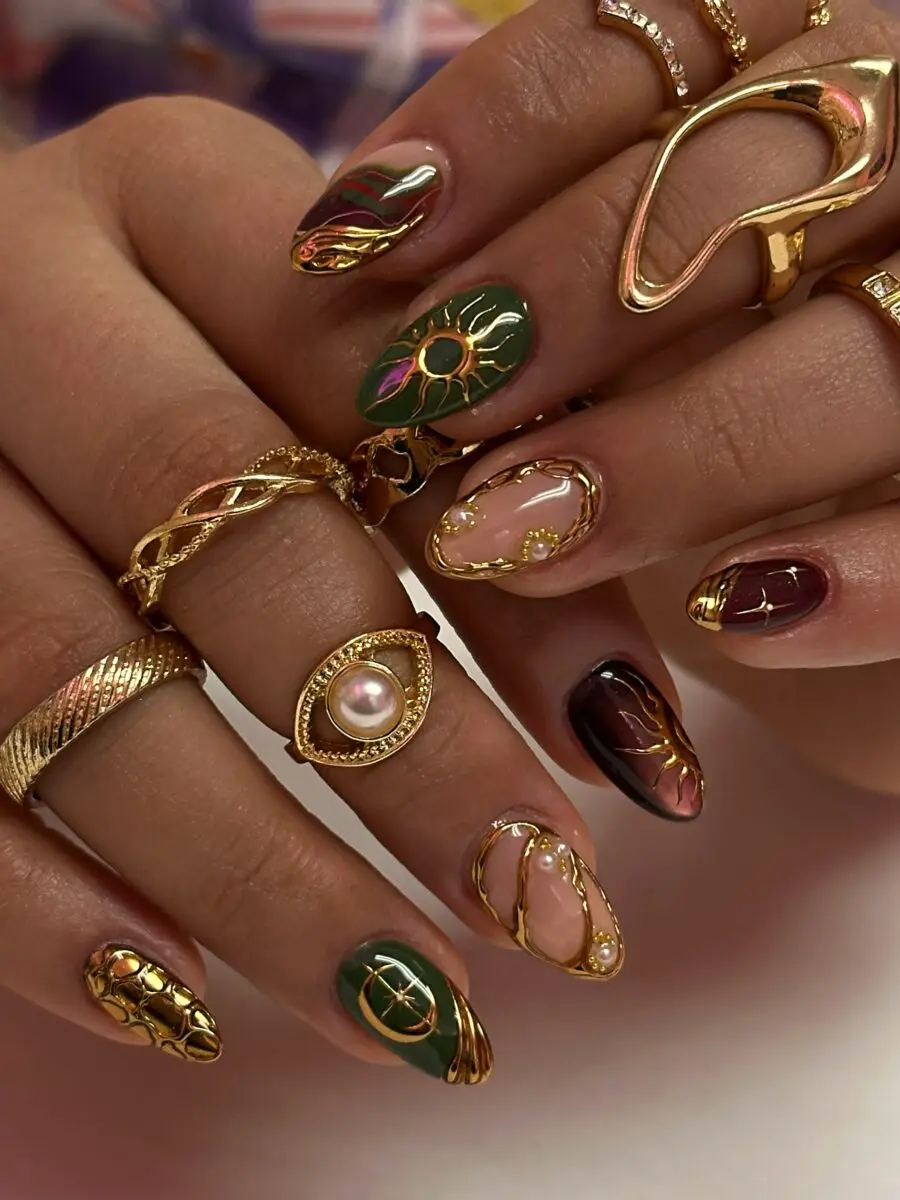 Chic almond nails with gold detailing