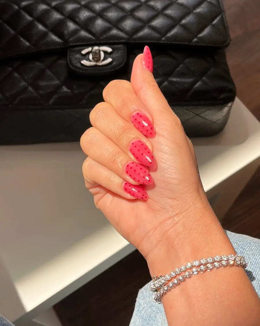 Chic Almond Nails with Playful Red Dots