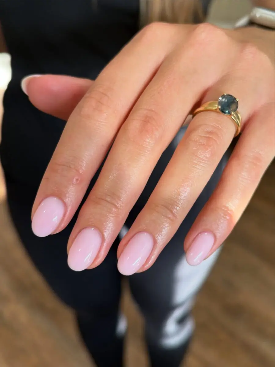 Elegant almond-shaped nails in soft pink hue