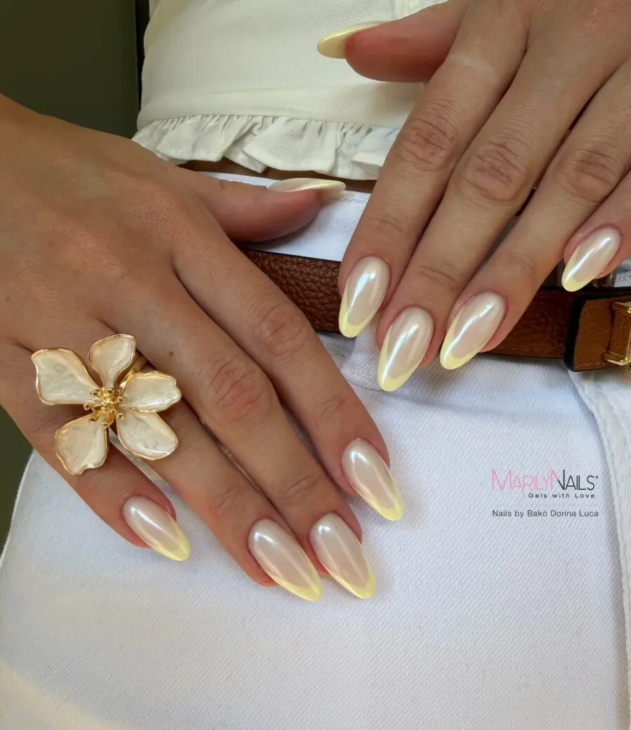 Elegant yellow-tipped almond nails for chic style