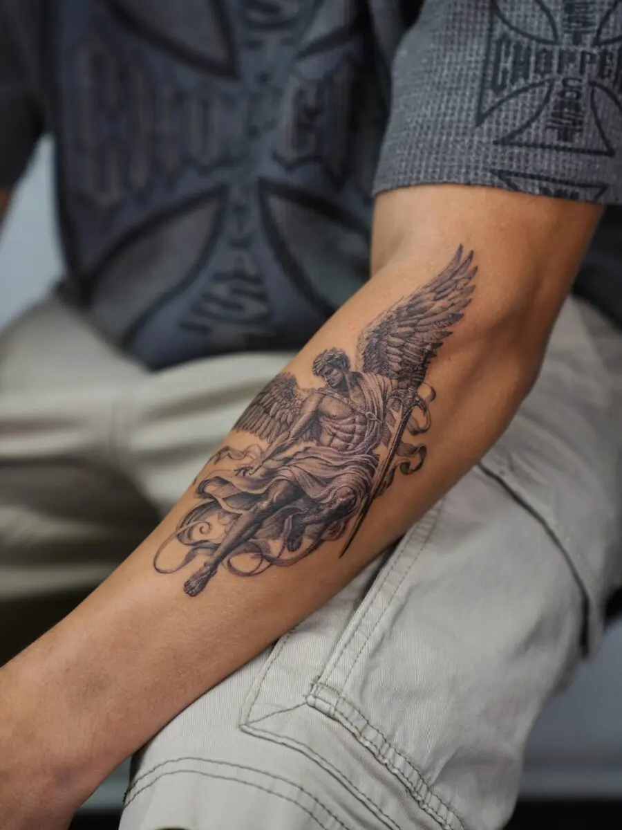 Majestic angel tattoo with intricate details