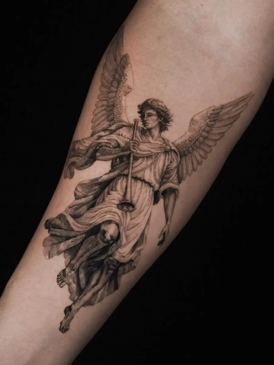 Stunning angel tattoo with biblical significance