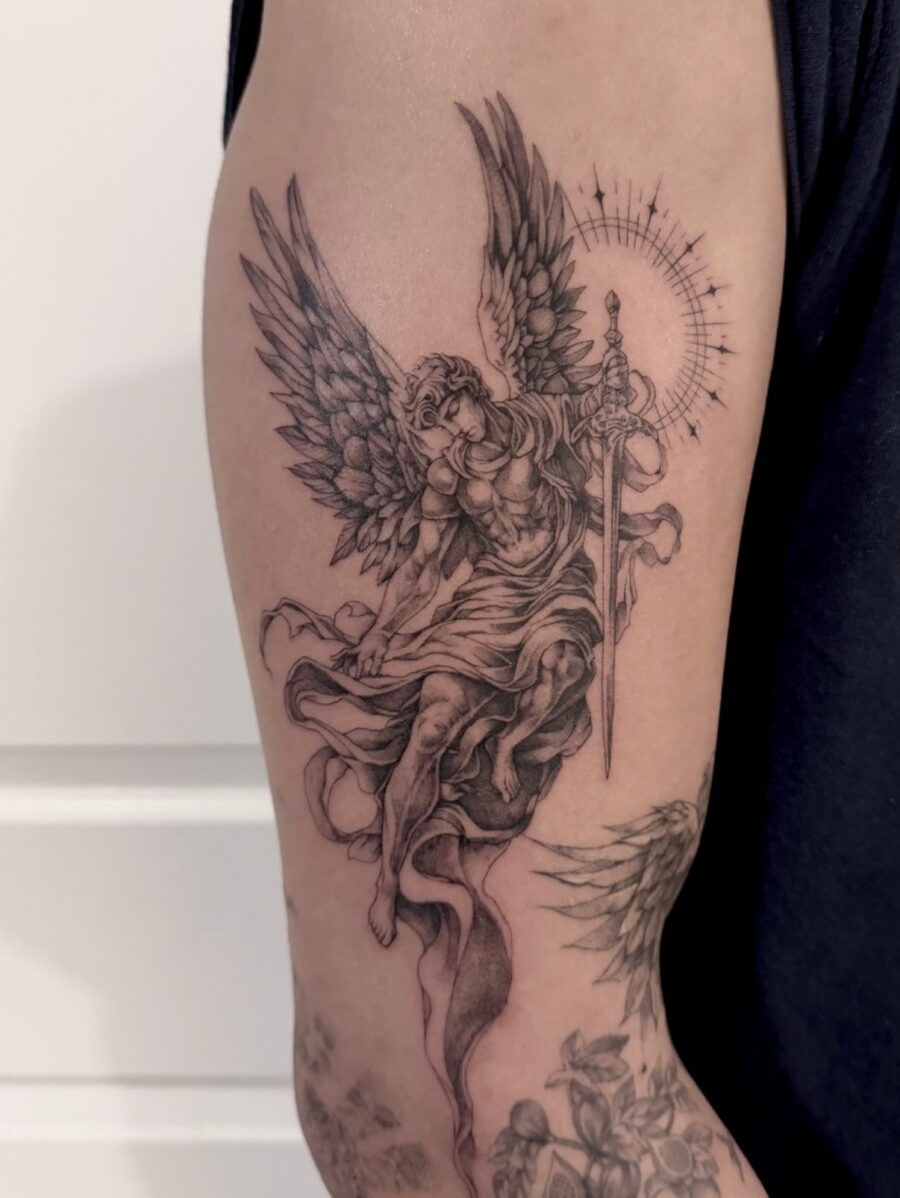 Majestic angelic archangel holding a sword