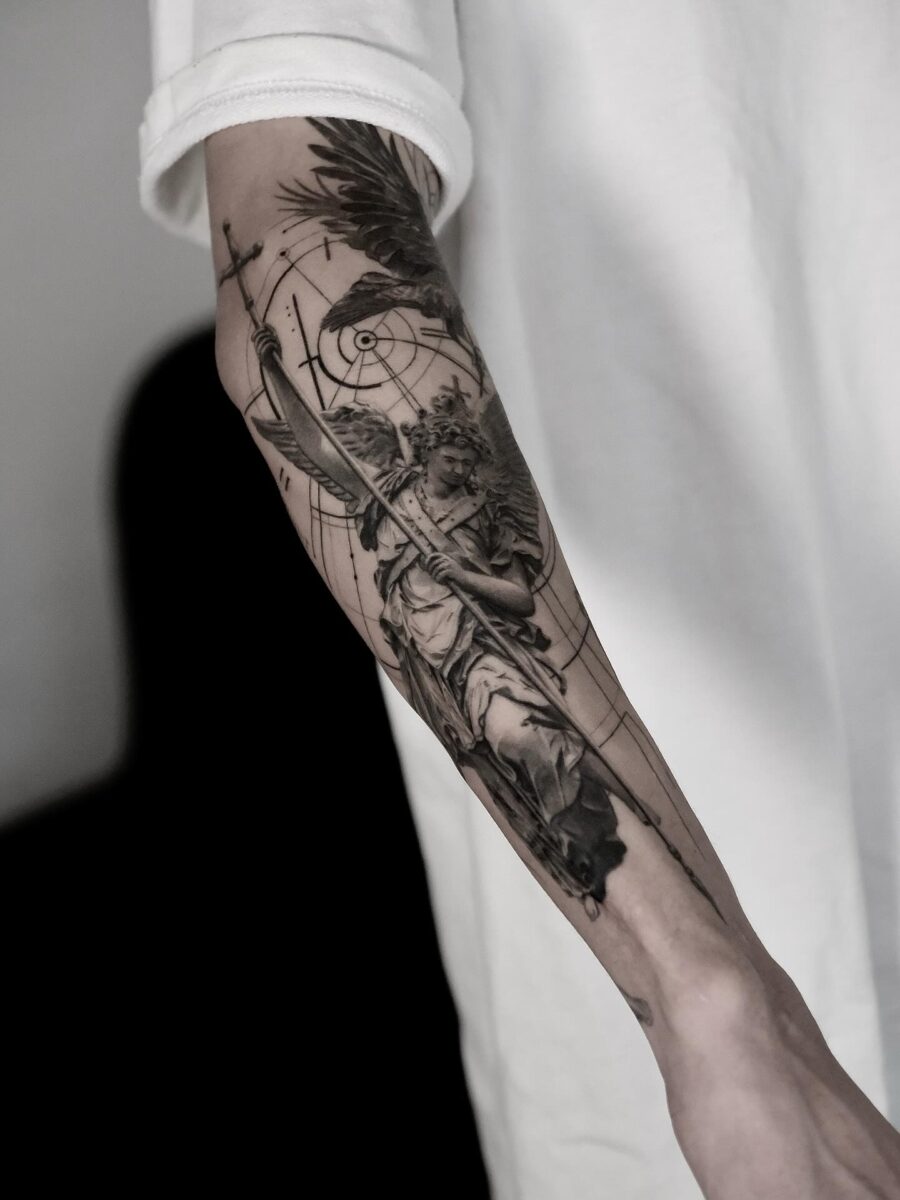 Majestic angel tattoo with intricate details