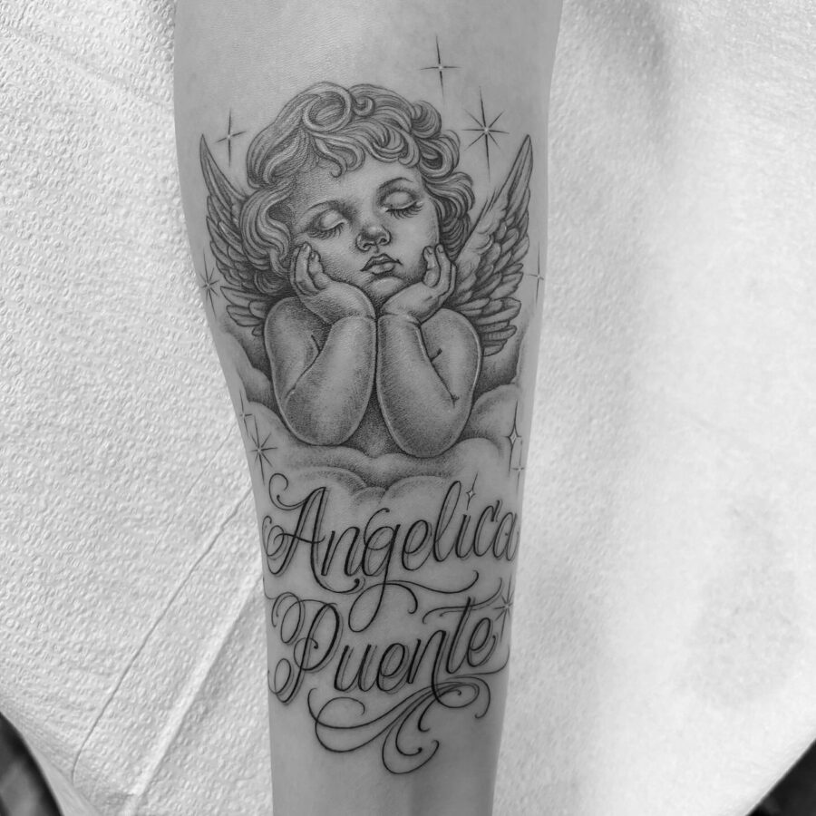Cherubic angel tattoo honoring a loved one
