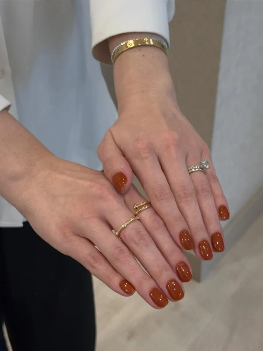 Gorgeous autumn-inspired brown nail design showcased