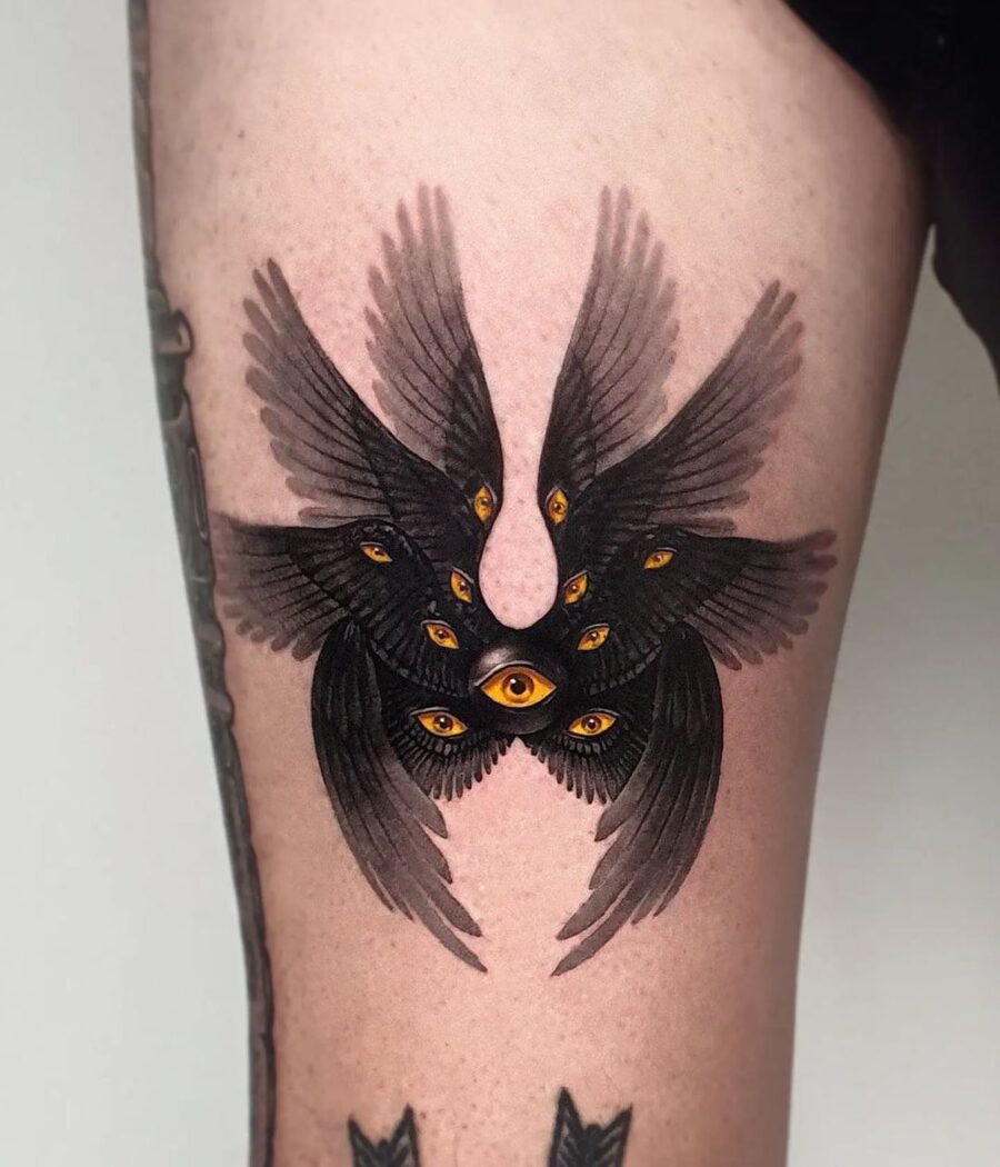 Mysterious bird tattoo with watchful eyes