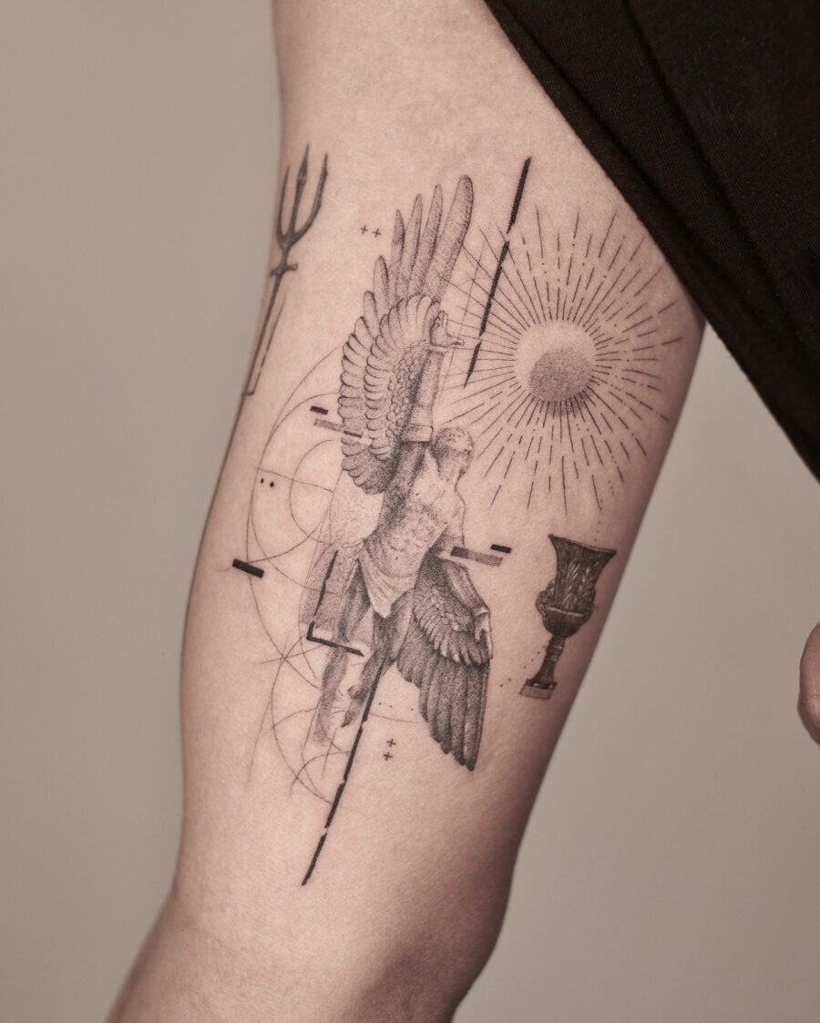 Stunning angelic tattoo with celestial elements