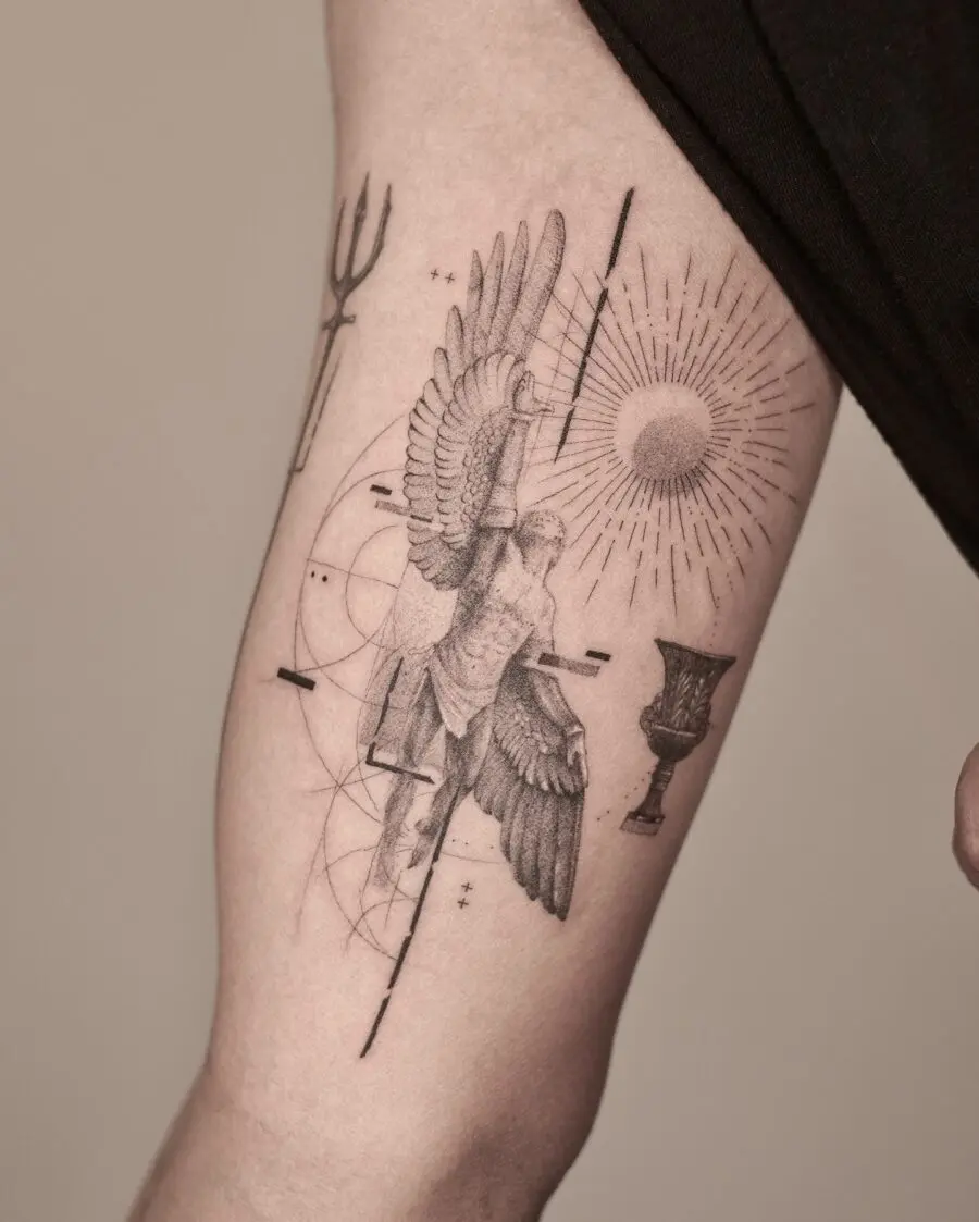 Stunning angelic tattoo with celestial elements