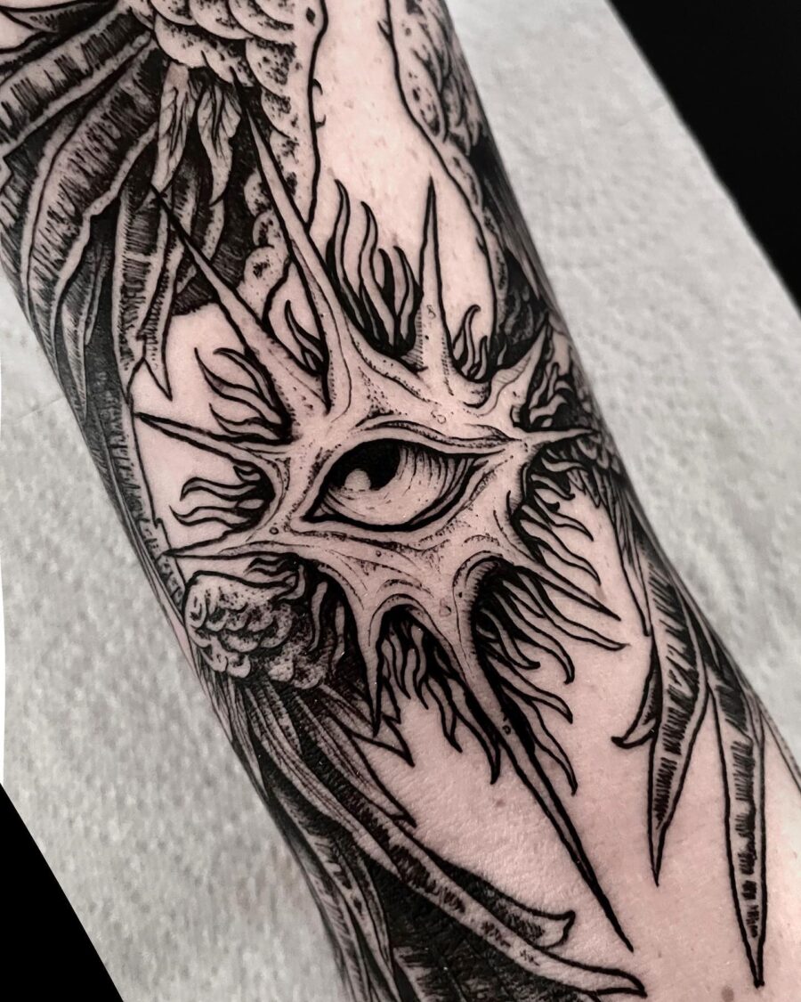 Symbolic Spiritual Eye Tattoo Design