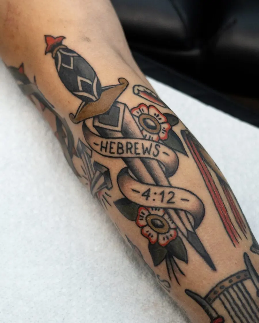 Stunning sword and floral biblical tattoo design