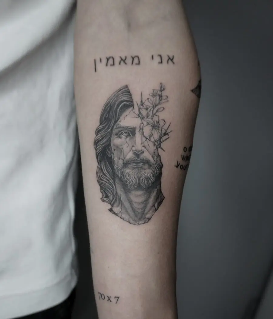 Striking Biblical Tattoo of Jesus with Flowers