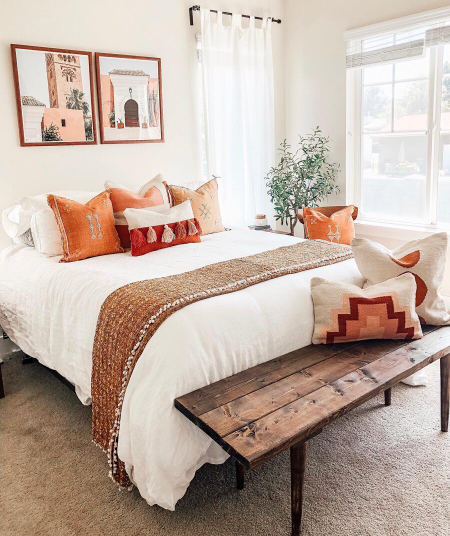 Stylish bohemian bedroom with vibrant textures