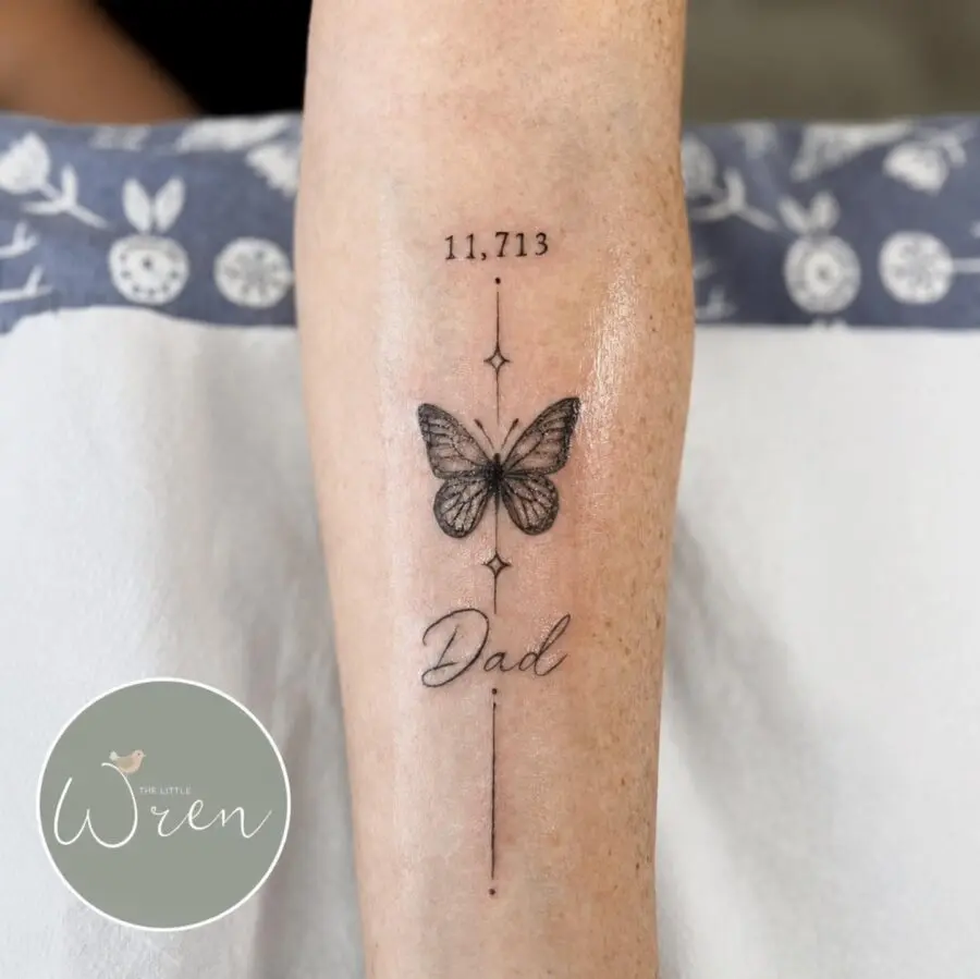 Elegant butterfly tattoo honoring a father’s memory