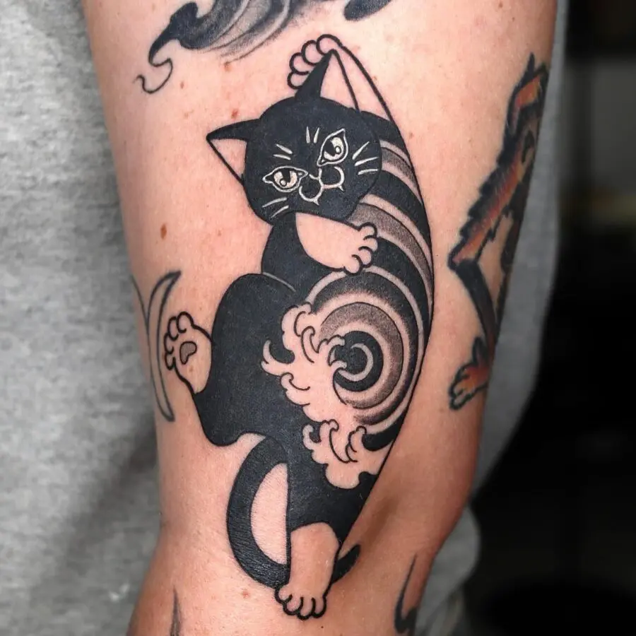 Intricate Japanese-style black cat tattoo design