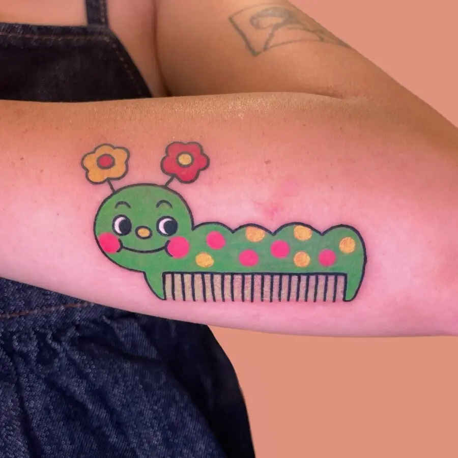 Whimsical caterpillar tattoo with vibrant colors