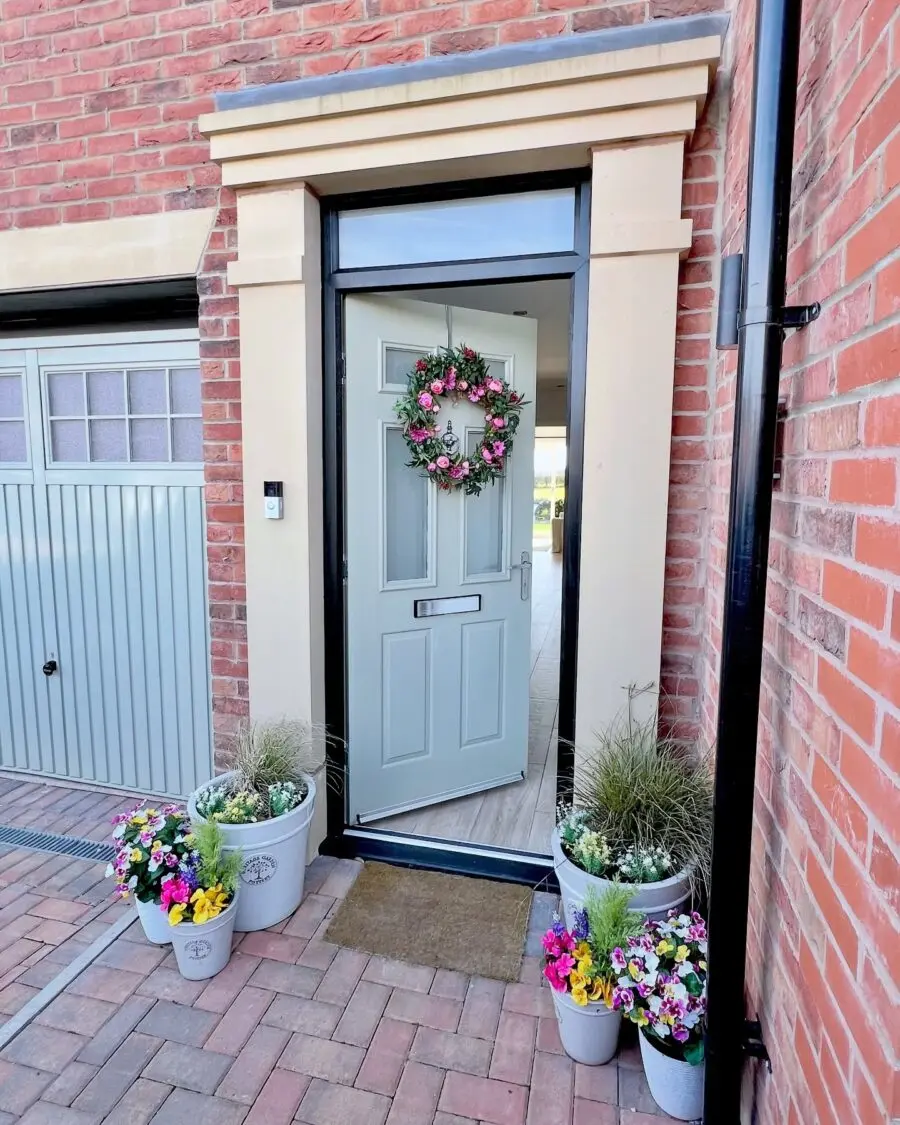 Charming front door with floral accents