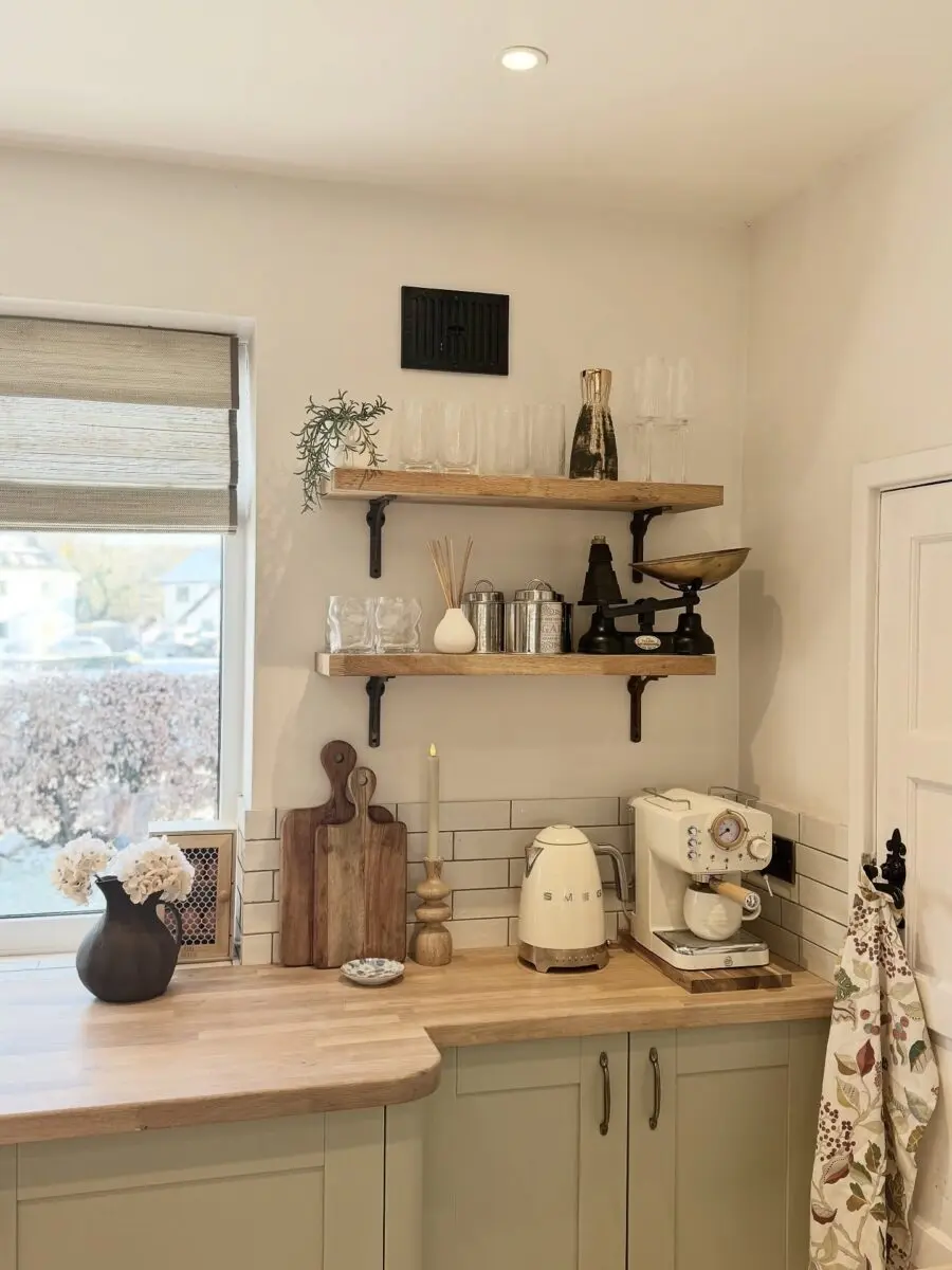 Stylish open shelves enhance kitchen aesthetics.