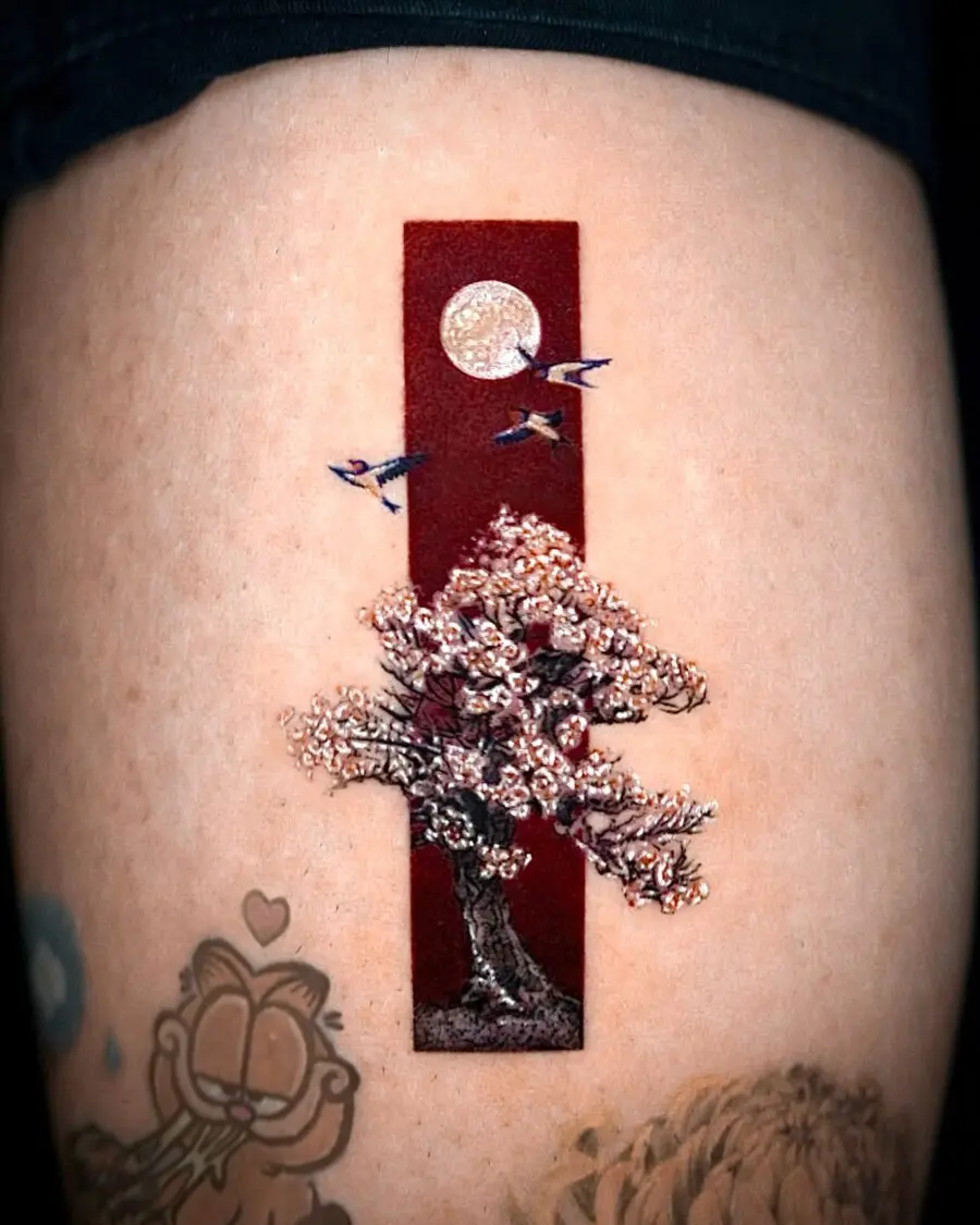 Elegant cherry blossom tattoo with moonlit background