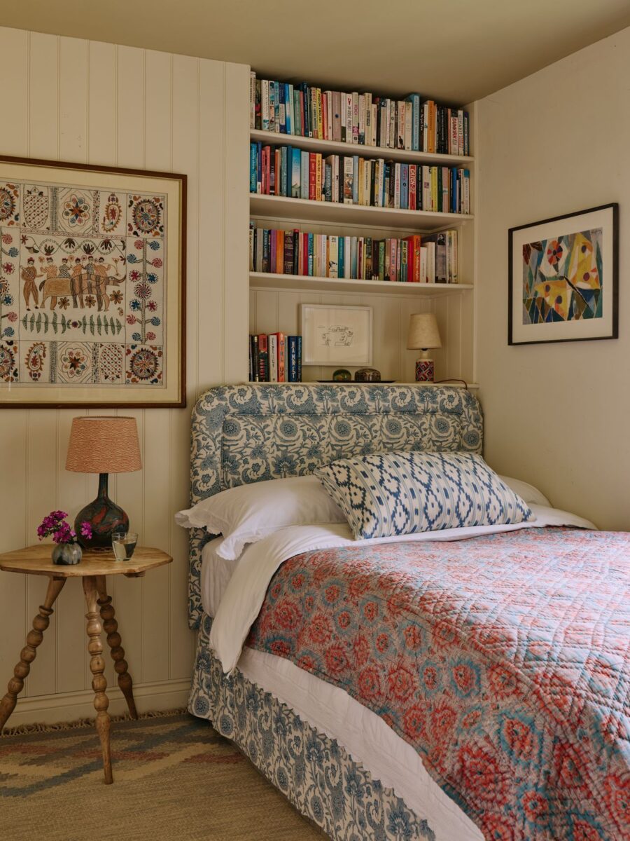 Charming bedroom with books and floral patterns