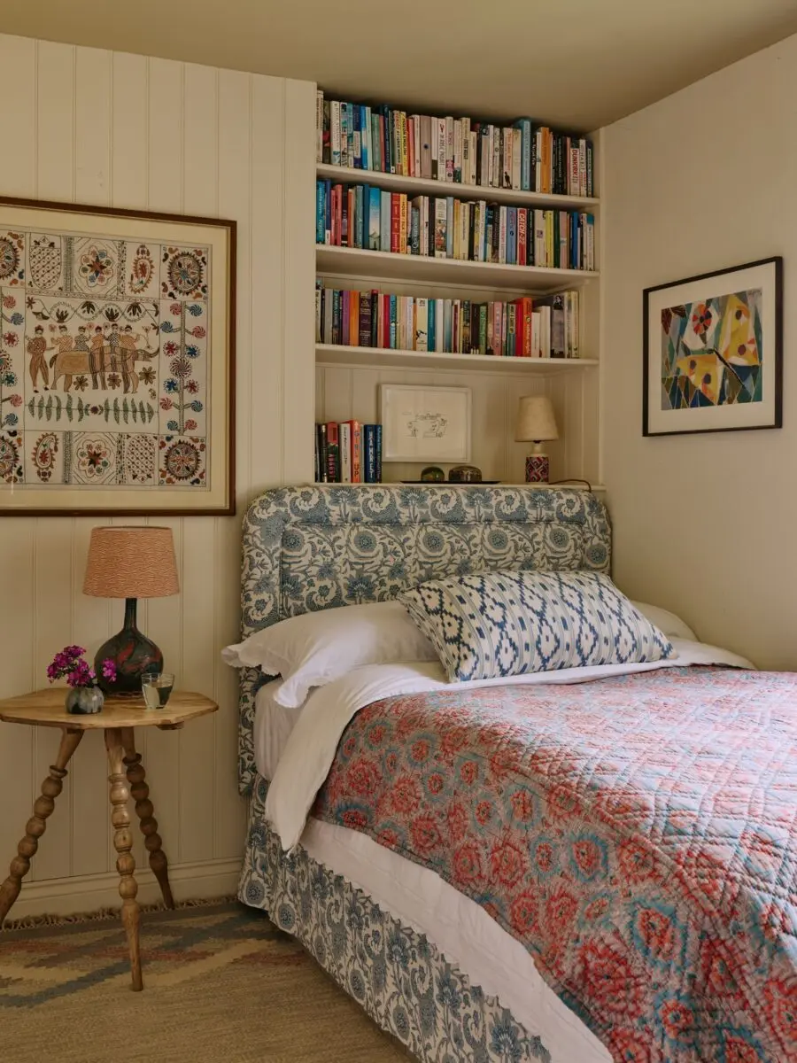 Charming bedroom with books and floral patterns