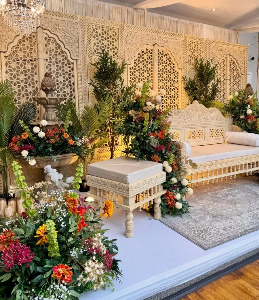 Elegant floral arrangements with intricate wooden details