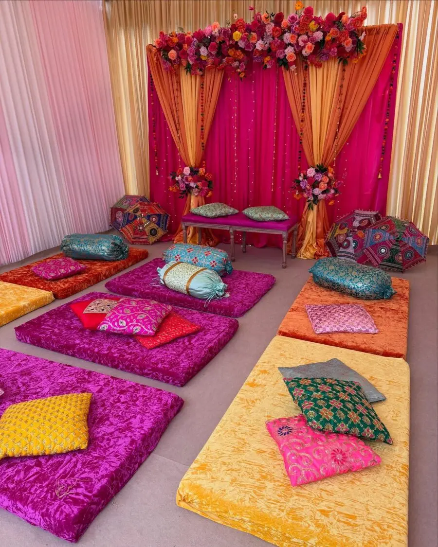 Vibrant Lounge Area with Floral Backdrop