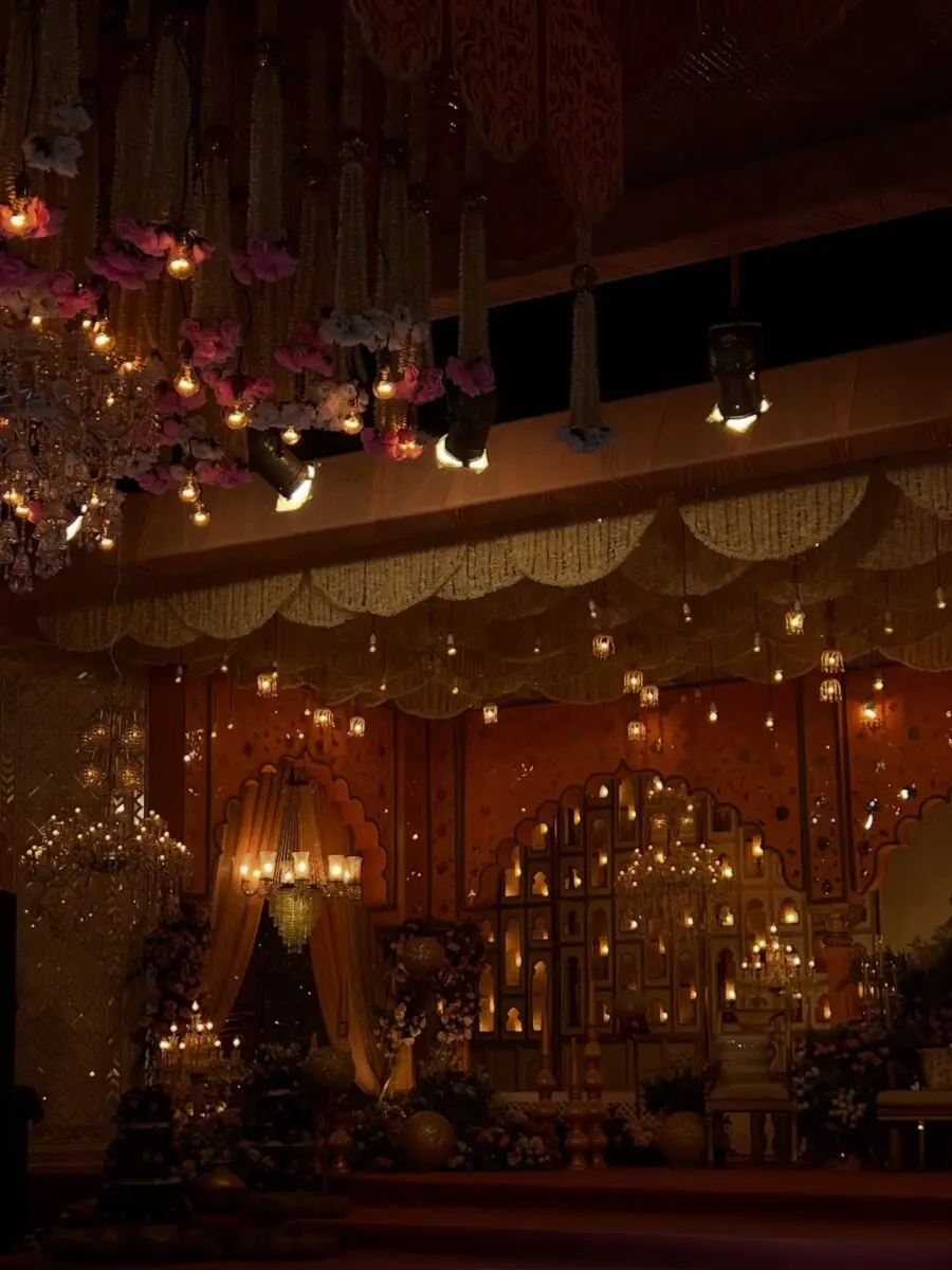 Elegant chandeliers and warm candlelight ambiance