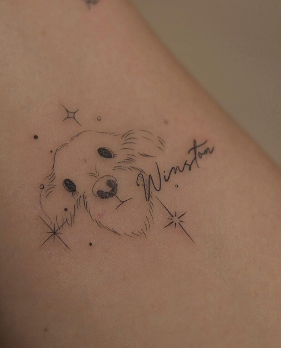 Heartfelt tribute tattoo of a beloved dog