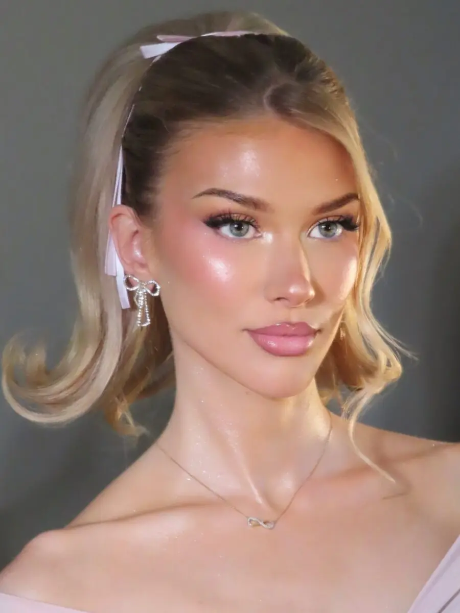 Stunning doll-like makeup with glowing skin