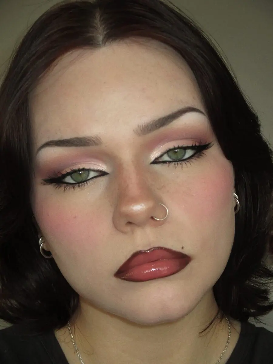 Artful doll makeup showcasing bold lip colors